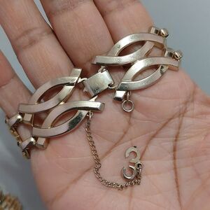 Vintage Monet High Gloss Gold Tone Interlocking Curved Bars Panel Bracelet